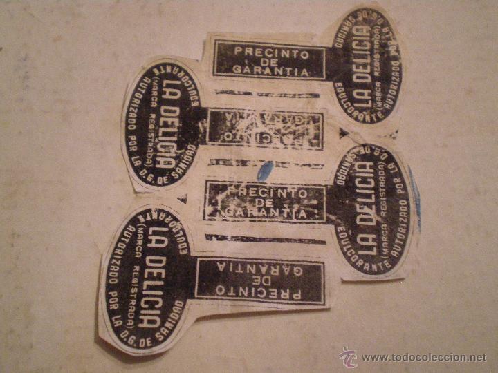 Old Labels: ETIQUETAS PRECINTO DE GARANTIA EDULCORANTE LA DELICIA. PRUEBA IMPRENTA.