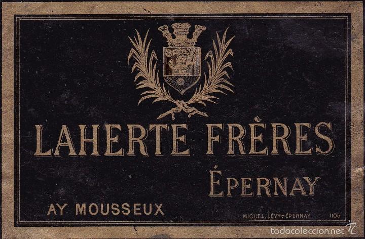 Etiquetas antiguas: Laherte Fr&egrave;res Epernay Mousseu 1899 (pegada a un papel)