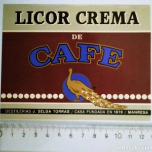 ETIQUETA LICOR CREMA DE CAFÉ DESTILERÍAS J.SELGA TORRAS CASA FUNDADA EN 1870 MANRESA LOGO PAVO REAL