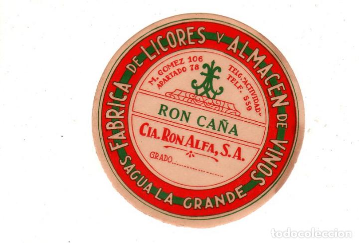 Alte Etiketten: ETIQUETA DE RON CA&Ntilde;A. FABRICA DE LICORES Y ALMACEN DE VINOS, SAGUA LA GRANDE. CIA. RON ALFA, S.A.