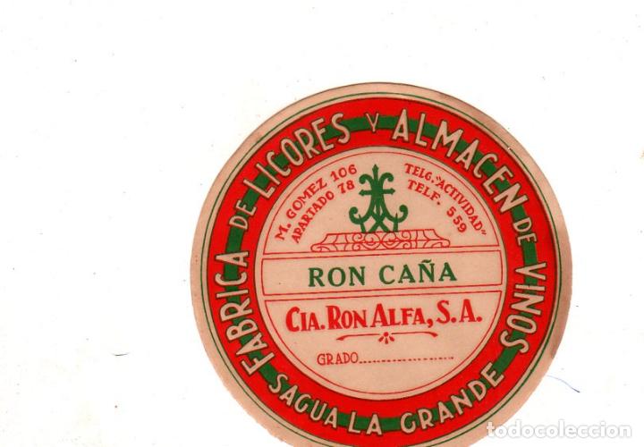 Alte Etiketten: ETIQUETA DE RON CA&Ntilde;A. FABRICA DE LICORES Y ALMACEN DE VINOS, SAGUA LA GRANDE. CIA. RON ALFA, S.A.