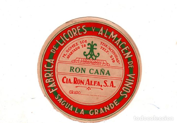 Alte Etiketten: ETIQUETA DE RON CA&Ntilde;A. FABRICA DE LICORES Y ALMACEN DE VINOS, SAGUA LA GRANDE. CIA. RON ALFA, S.A.