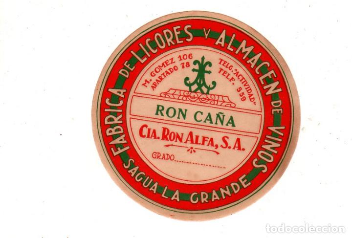 Alte Etiketten: ETIQUETA DE RON CA&Ntilde;A. FABRICA DE LICORES Y ALMACEN DE VINOS, SAGUA LA GRANDE. CIA. RON ALFA, S.A.