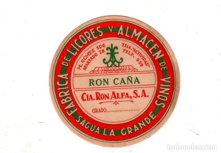 Alte Etiketten: ETIQUETA DE RON CA&Ntilde;A. FABRICA DE LICORES Y ALMACEN DE VINOS, SAGUA LA GRANDE. CIA. RON ALFA, S.A.