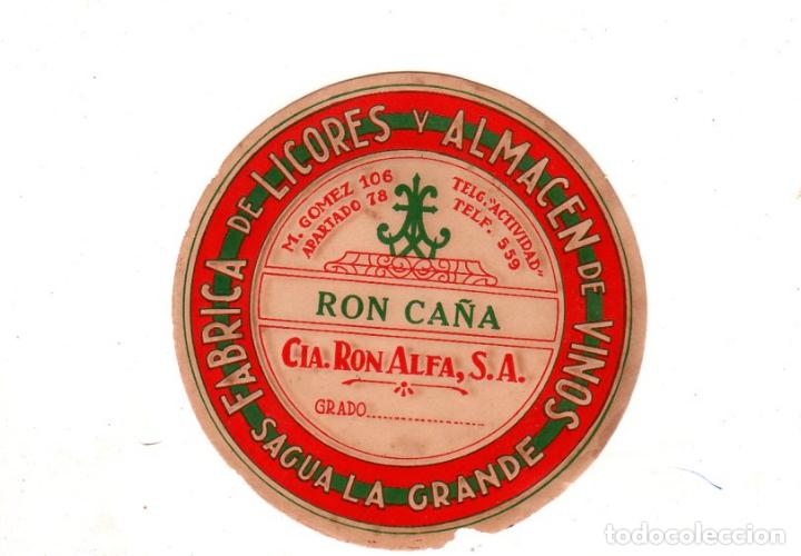 Alte Etiketten: ETIQUETA DE RON CA&Ntilde;A. FABRICA DE LICORES Y ALMACEN DE VINOS, SAGUA LA GRANDE. CIA. RON ALFA, S.A.