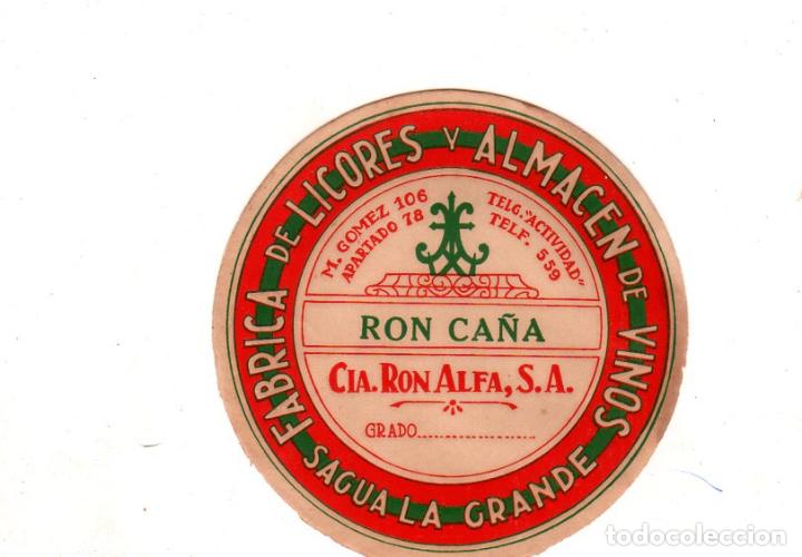 Alte Etiketten: ETIQUETA DE RON CA&Ntilde;A. FABRICA DE LICORES Y ALMACEN DE VINOS, SAGUA LA GRANDE. CIA. RON ALFA, S.A.