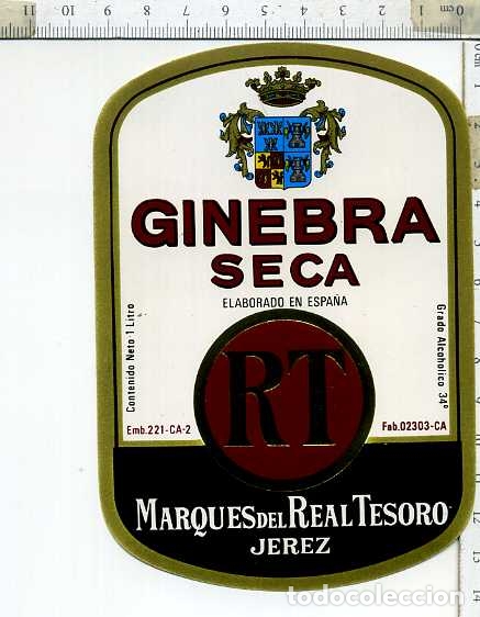 Etiquetas antiguas: ETIQUETA DE GINEBRA SECA MARQUES DEL REAL TESORO JEREZ