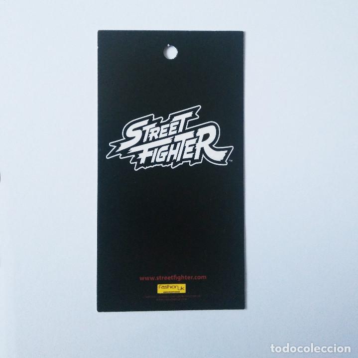 Etiquetas antiguas: etiqueta street fighter licencia ropa fighter