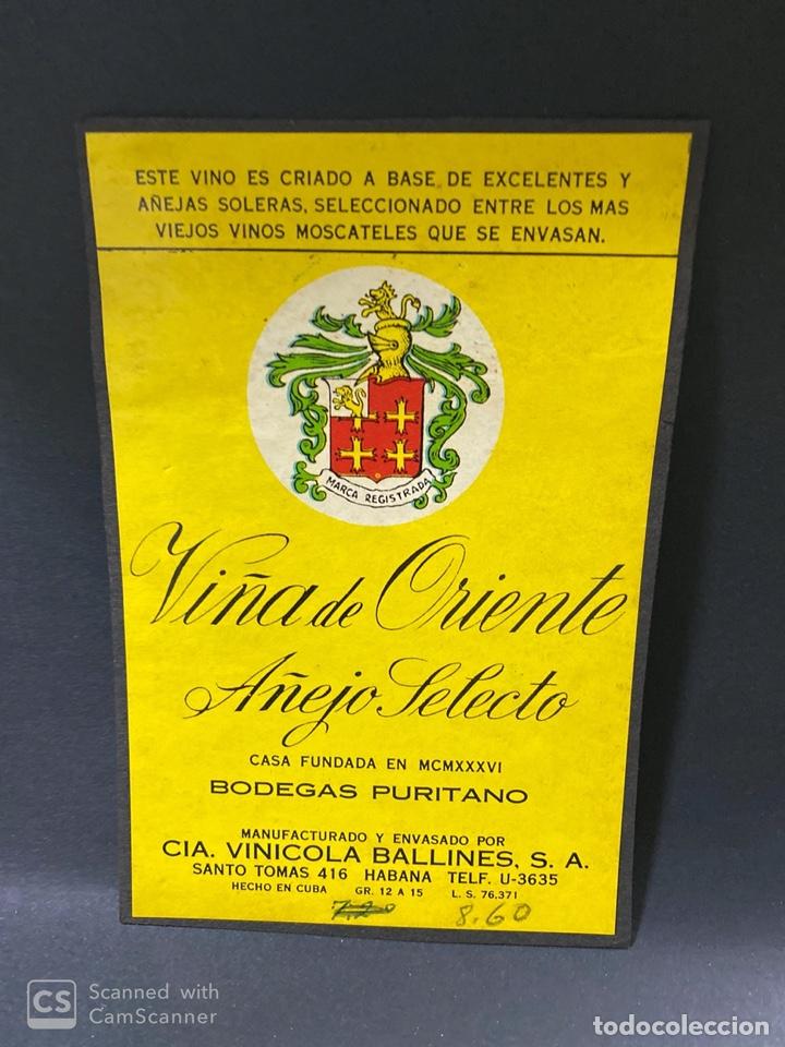 Alte Etiketten: ETIQUETA DE VINO. CUBA. HABANA. BODEGAS PURITANO. VI&Ntilde;A DE ORIENTE A&Ntilde;EJO SELECTO.