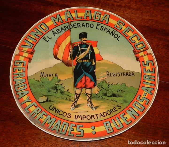 Etiquetas antiguas: ETIQUETA DE VINO M&Aacute;LAGA SECO. GERADA Y CREMADES. BUENOS AIRES. 27 CM. DE DI&Aacute;METRO.