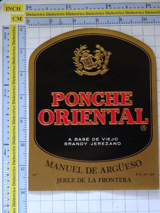 Alte Etiketten: ETIQUETA DE BEBIDAS. VINOS LICORES. PONCHE ORIENTAL A BASE DE VIEJO BRANDY JEREZANO . 196