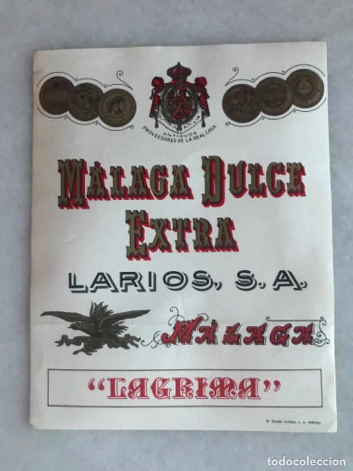 Etiquetas antiguas: Etiqueta de vino M&aacute;laga dulce extra. Larios SA