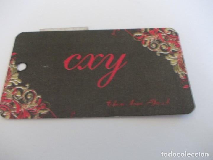 Etiquetas antiguas: Etiqueta ropa Cxy - Foto 1
