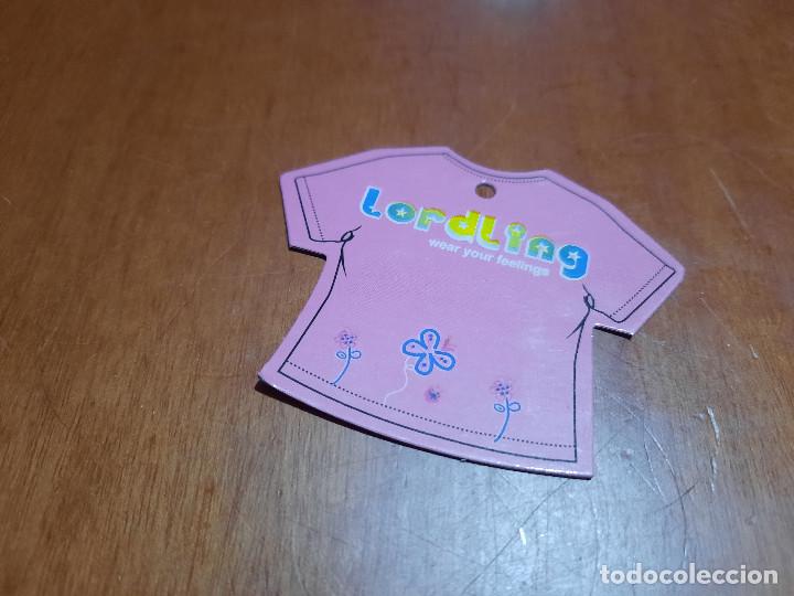 Etiquetas antiguas: LORDLING. FORMA DE CAMISETA. PEQUE&Ntilde;A ETIQUETA. BUEN ESTADO. USADA.