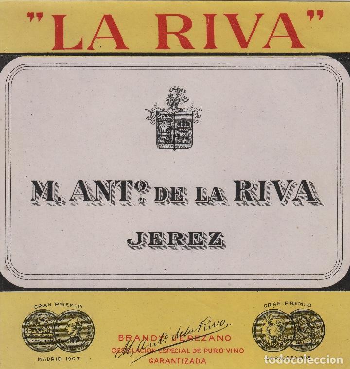 Etiquetas antigas: DE LA RIVA M. ANT&ordm; .JEREZ . ETIQUETA VINO 12X 12,5 cm ORIGINAL ref 21