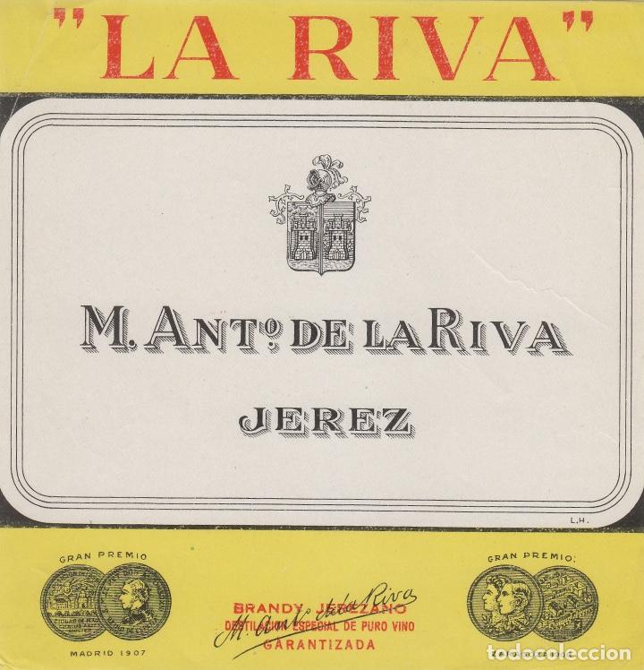 Etiquetas antigas: DE LA RIVA M. ANT&ordm; .JEREZ . ETIQUETA VINO 12X 12,5 cm ORIGINAL ref 21