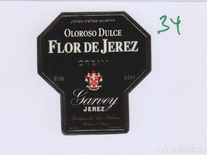 Etiquetas antiguas: GARVEY .JEREZ. FLOR DE JEREZ , PEQUE&Ntilde;A 5X 3 CM . ETIQUETA VINO ORIGINAL ref 34