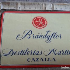 Etiquetas antiguas: ETIQUETA DE BRANDY FLOR - DESTILERIAS MARTINEZ - CAZALLA. Lote 297071643