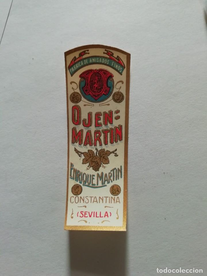Etiquetas antiguas: Etiqueta ojen Mart&iacute;n fabrica de anisados Enrique Mart&iacute;n Constantina 8.5x3 cm