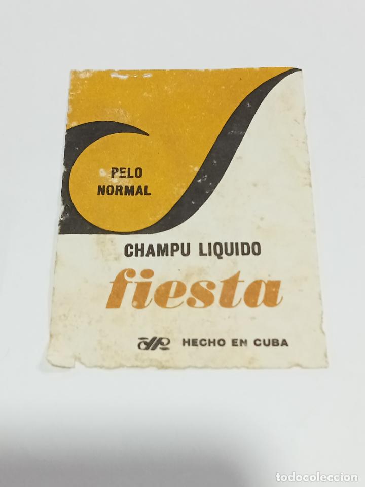 Etichette antiche: ANTIGUA ETIQUETA. CHAMP&Uacute; LIQUIDO FIESTA. PELO NORMAL. DP. HECHO EN CUBA. 6 X 8 CM