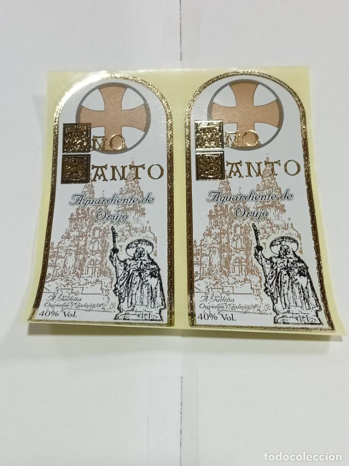 Etichette antiche: LOTE DE 2 ETIQUETA. PEGATINA. A&Ntilde;O SANTO. AGUARDIENTE DE ORUJO. 6 X 13 CM