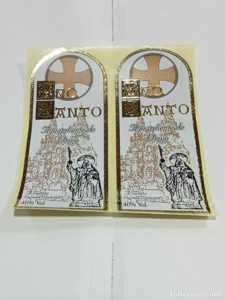 Etichette antiche: LOTE DE 2 ETIQUETA. PEGATINA. A&Ntilde;O SANTO. AGUARDIENTE DE ORUJO. 6 X 13 CM