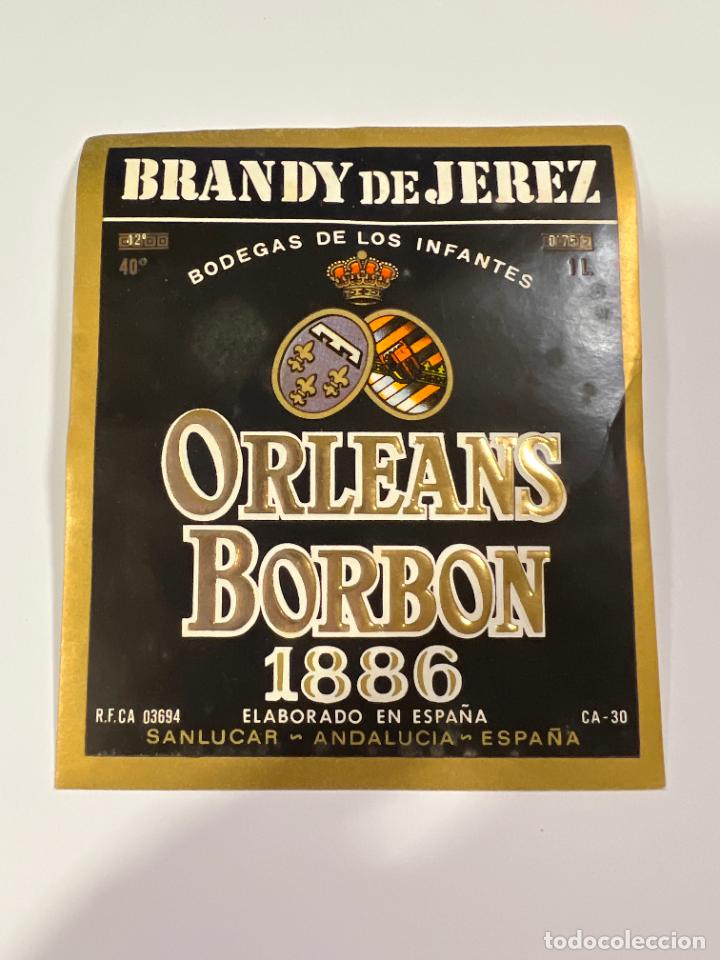 Alte Etiketten: ETIQUETA. BRANDY DE JEREZ. BODEGA DE LOS INFANTES DE OLEANS-BORBON. SANLUCAR. MEDIDAS: 10 X 11 CM
