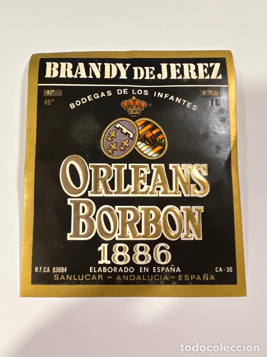 Alte Etiketten: ETIQUETA. BRANDY DE JEREZ. BODEGA DE LOS INFANTES DE OLEANS-BORBON. SANLUCAR. MEDIDAS: 10 X 11 CM