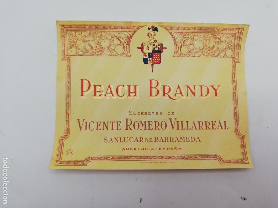 Alte Etiketten: ETIQUETA. PEACH BRANDY. SC.VICENTE ROMERO. SANLUCAR DE BARRAMEDA. MED : 11 X 14 CM APROX.