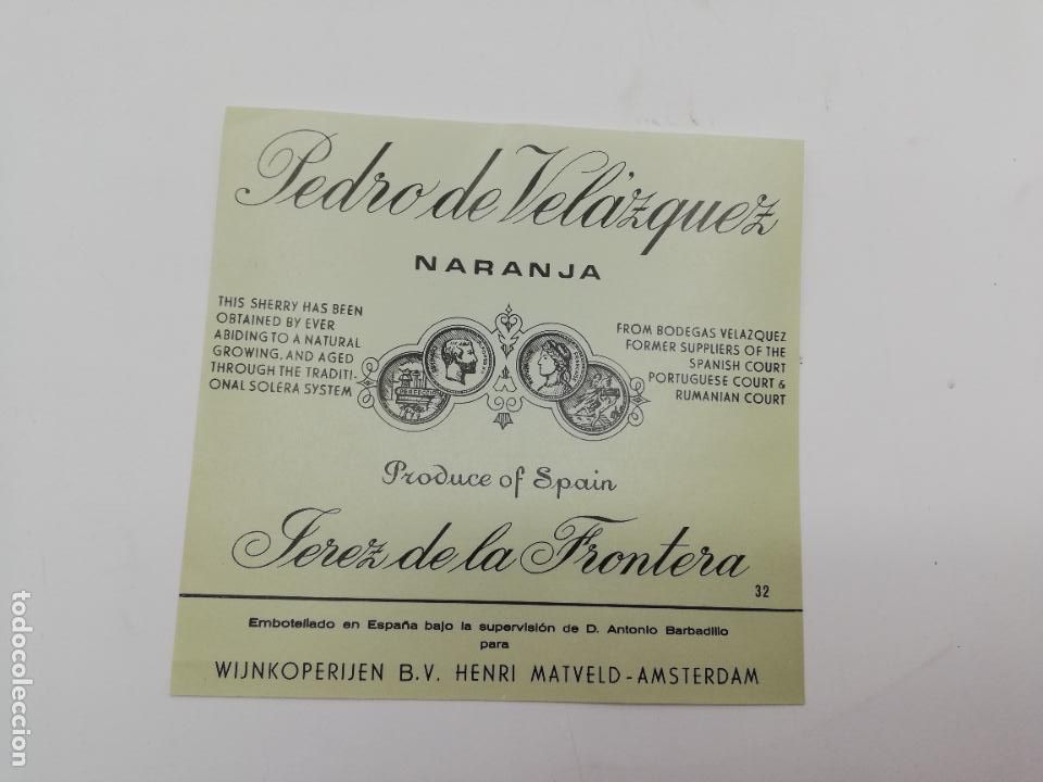 Etiquetas antiguas: ETIQUETA. PEDRO DE VELAZQUEZ. NARANJA. JEREZ DE LA FRONTERA. MED : 11 X 11 CM APROX.