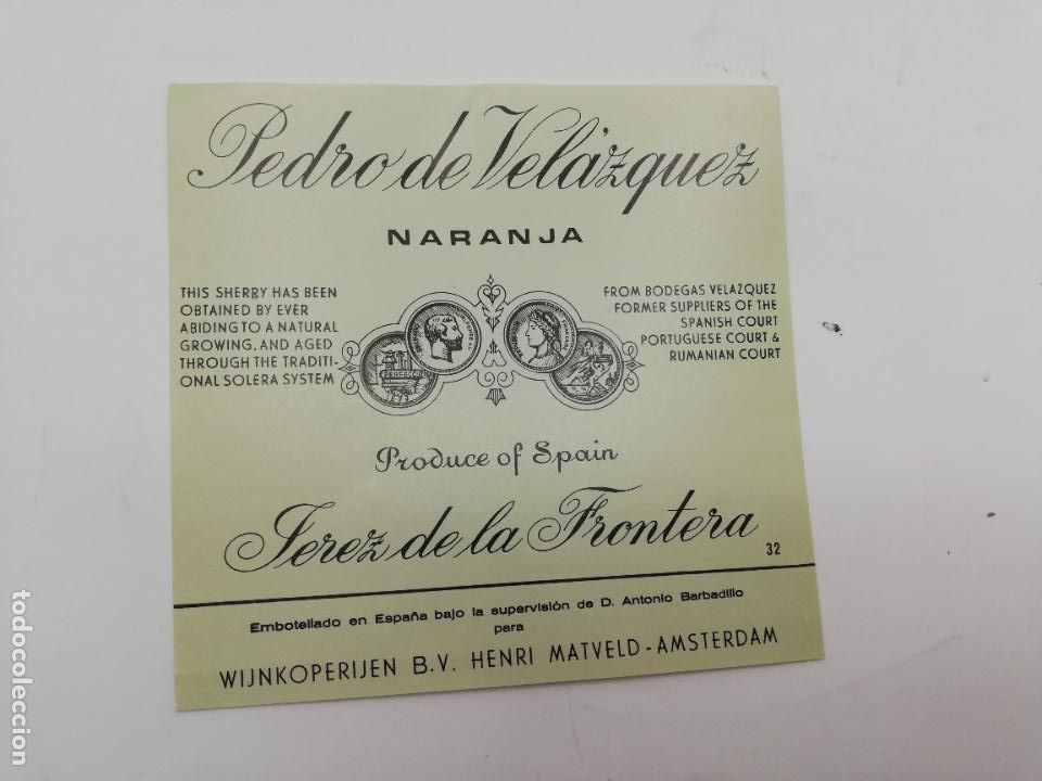 Etiquetas antiguas: ETIQUETA. PEDRO DE VELAZQUEZ. NARANJA. JEREZ DE LA FRONTERA. MED : 11 X 11 CM APROX.