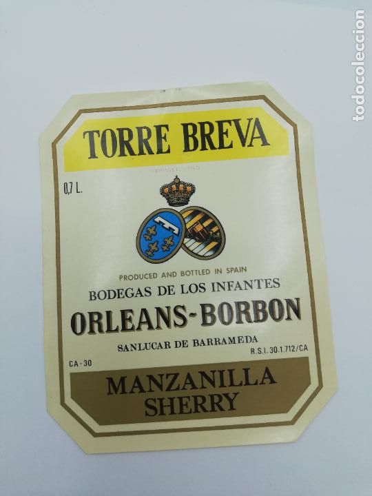 Alte Etiketten: ETIQUETA. TORRE BREVA. BODEGAS DE LOS INFANTES ORLEANS-BORBON. MANZANILLA SHERRY. SANLUCAR BARRAMEDA