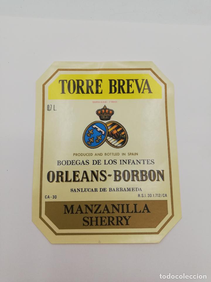 Alte Etiketten: ETIQUETA. TORRE BREVA. BODEGAS DE LOS INFANTES ORLEANS-BORBON. MANZANILLA SHERRY. SANLUCAR BARRAMEDA