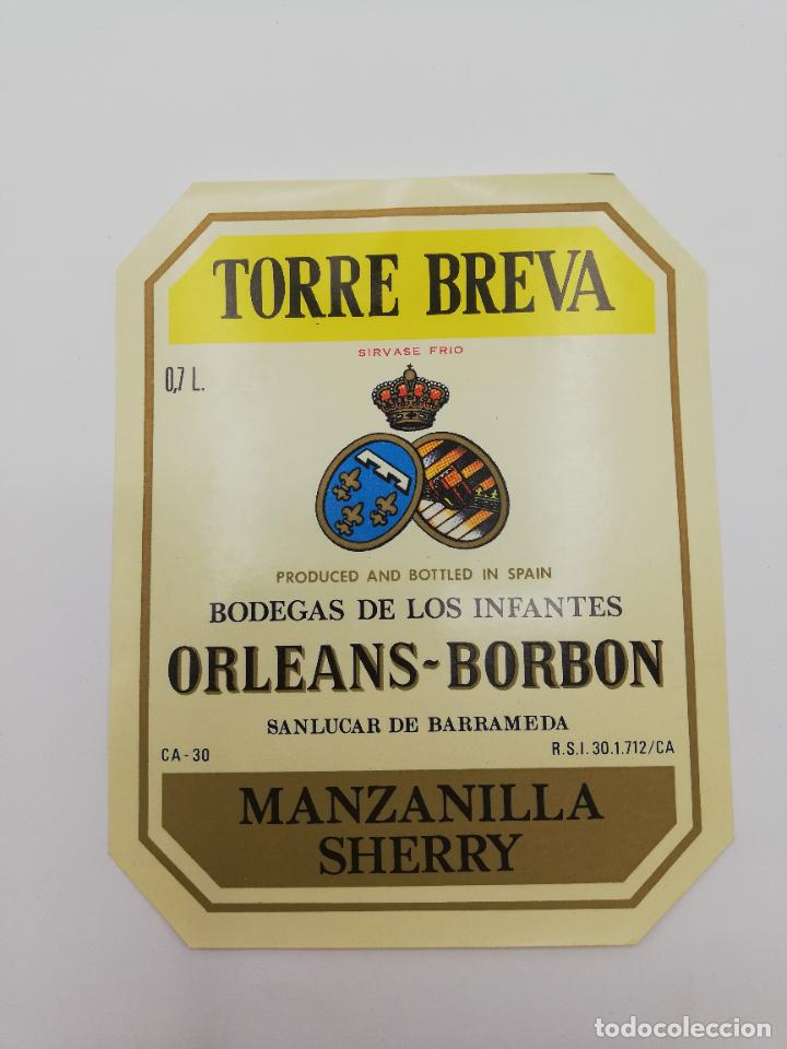 Alte Etiketten: ETIQUETA. TORRE BREVA. BODEGAS DE LOS INFANTES ORLEANS-BORBON. MANZANILLA SHERRY. SANLUCAR BARRAMEDA