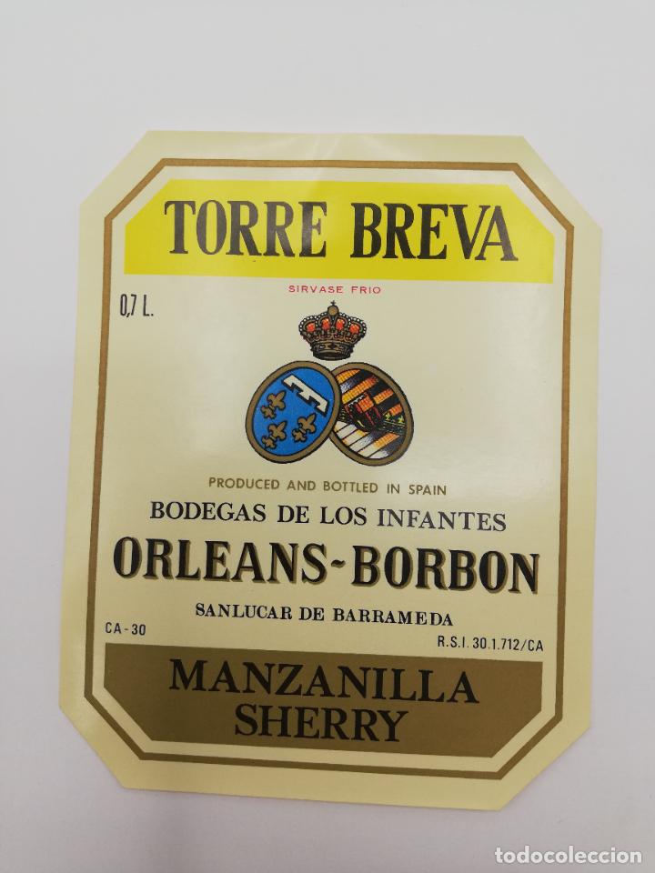 Alte Etiketten: ETIQUETA. TORRE BREVA. BODEGAS DE LOS INFANTES ORLEANS-BORBON. MANZANILLA SHERRY. SANLUCAR BARRAMEDA