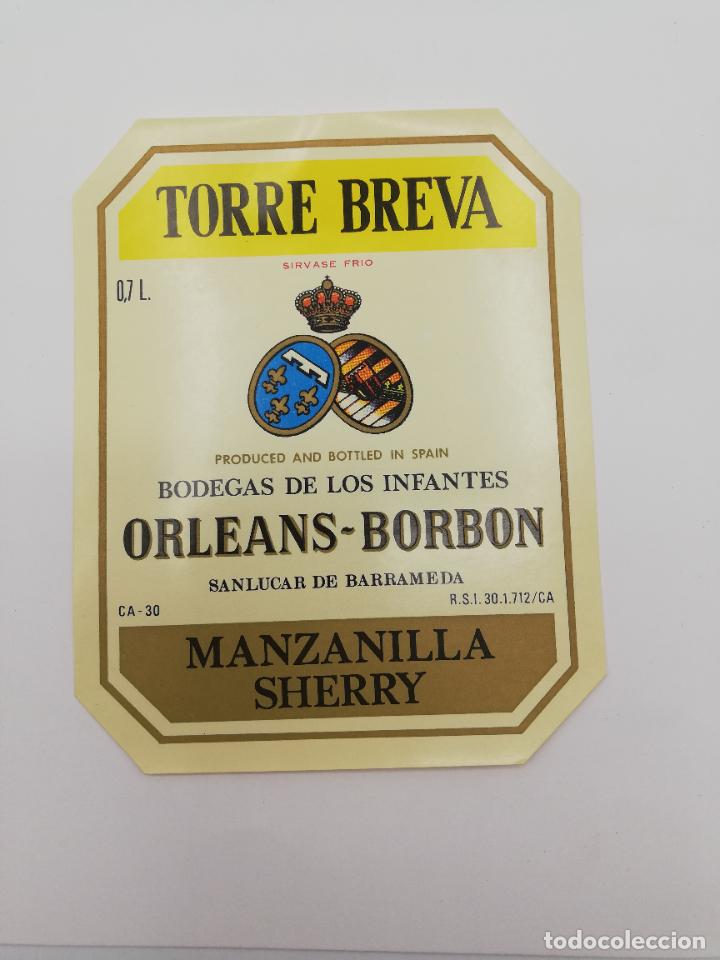 Alte Etiketten: ETIQUETA. TORRE BREVA. BODEGAS DE LOS INFANTES ORLEANS-BORBON. MANZANILLA SHERRY. SANLUCAR BARRAMEDA