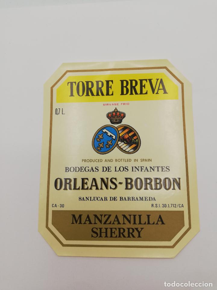 Alte Etiketten: ETIQUETA. TORRE BREVA. BODEGAS DE LOS INFANTES ORLEANS-BORBON. MANZANILLA SHERRY. SANLUCAR BARRAMEDA