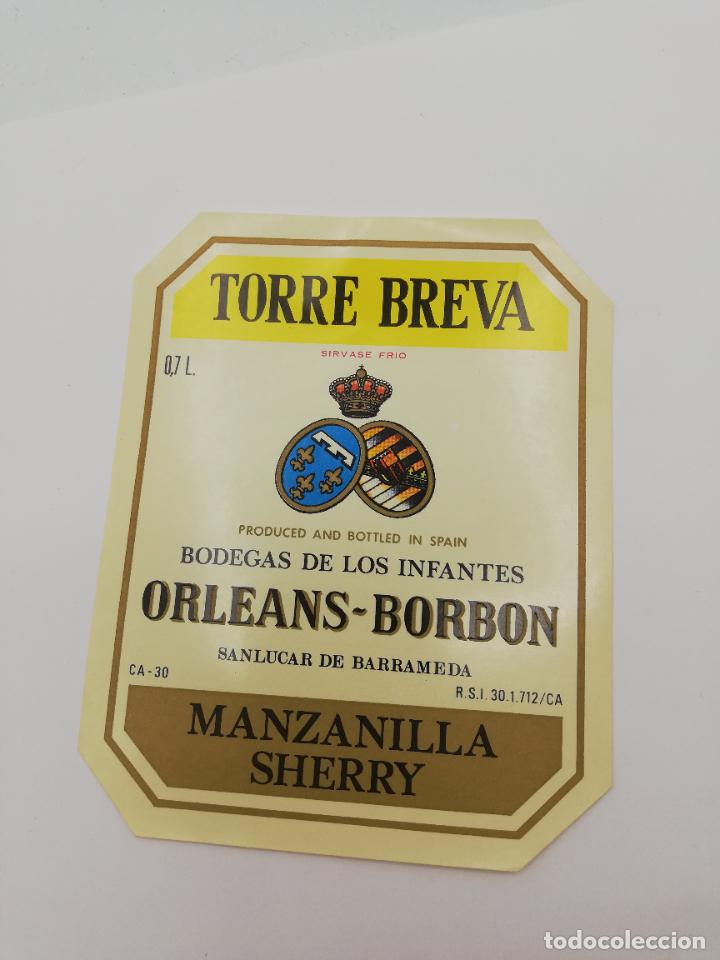 Alte Etiketten: ETIQUETA. TORRE BREVA. BODEGAS DE LOS INFANTES ORLEANS-BORBON. MANZANILLA SHERRY. SANLUCAR BARRAMEDA