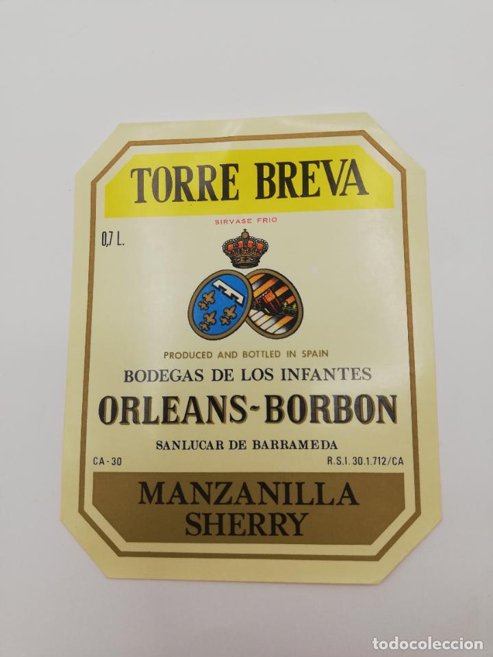 Alte Etiketten: ETIQUETA. TORRE BREVA. BODEGAS DE LOS INFANTES ORLEANS-BORBON. MANZANILLA SHERRY. SANLUCAR BARRAMEDA