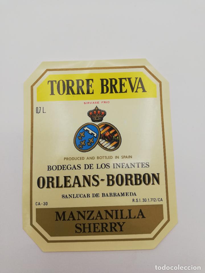 Alte Etiketten: ETIQUETA. TORRE BREVA. BODEGAS DE LOS INFANTES ORLEANS-BORBON. MANZANILLA SHERRY. SANLUCAR BARRAMEDA