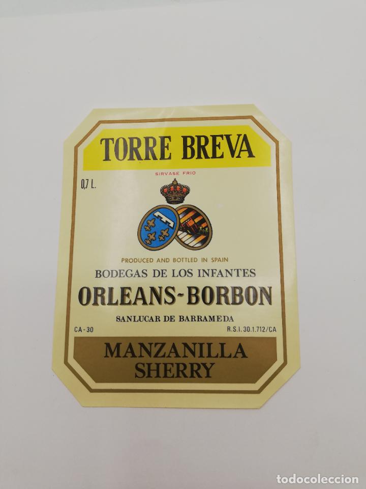 Alte Etiketten: ETIQUETA. TORRE BREVA. BODEGAS DE LOS INFANTES ORLEANS-BORBON. MANZANILLA SHERRY. SANLUCAR BARRAMEDA