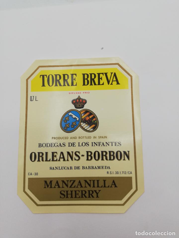 Alte Etiketten: ETIQUETA. TORRE BREVA. BODEGAS DE LOS INFANTES ORLEANS-BORBON. MANZANILLA SHERRY. SANLUCAR BARRAMEDA