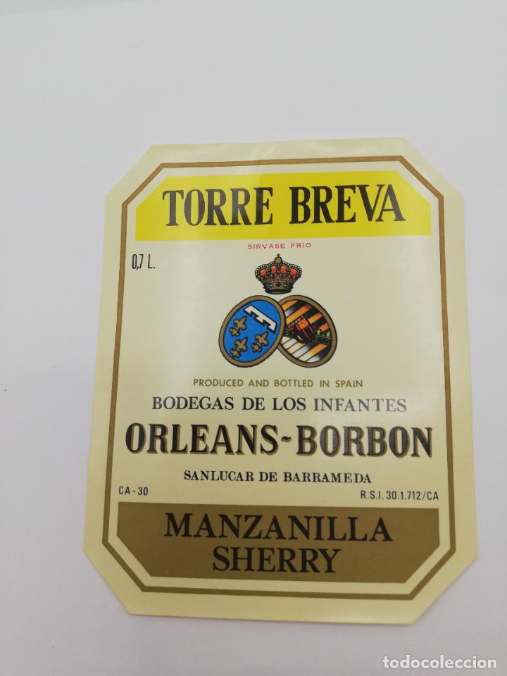 Alte Etiketten: ETIQUETA. TORRE BREVA. BODEGAS DE LOS INFANTES ORLEANS-BORBON. MANZANILLA SHERRY. SANLUCAR BARRAMEDA