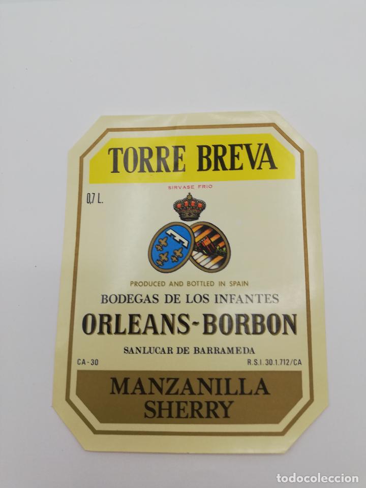 Alte Etiketten: ETIQUETA. TORRE BREVA. BODEGAS DE LOS INFANTES ORLEANS-BORBON. MANZANILLA SHERRY. SANLUCAR BARRAMEDA