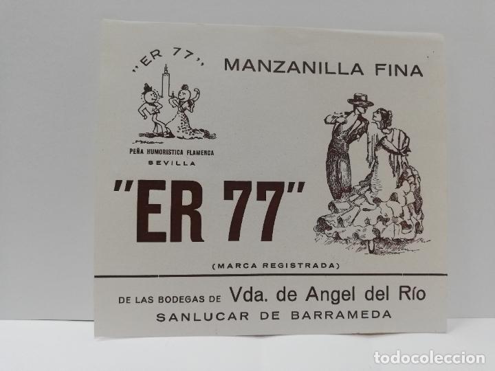 Etiquetas antiguas: ETIQUETA DE VINO. MANZANILLA FINA &uml;ER 77&uml;. VDA. DE ANGEL DEL RIO. SANLUCAR DE BARRAMEDA.