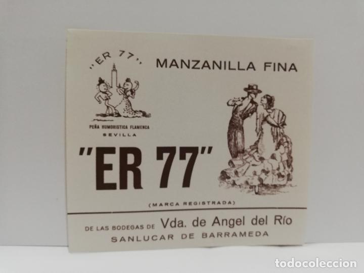 Etiquetas antiguas: ETIQUETA DE VINO. MANZANILLA FINA &uml;ER 77&uml;. VDA. DE ANGEL DEL RIO. SANLUCAR DE BARRAMEDA.