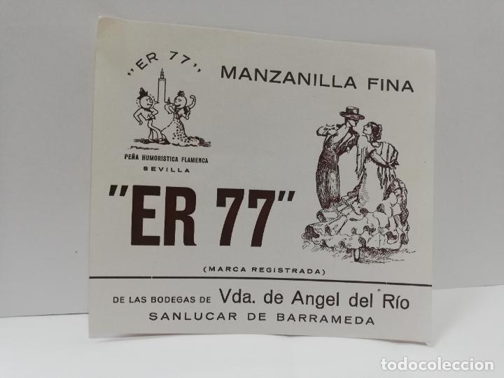 Etiquetas antiguas: ETIQUETA DE VINO. MANZANILLA FINA &uml;ER 77&uml;. VDA. DE ANGEL DEL RIO. SANLUCAR DE BARRAMEDA.