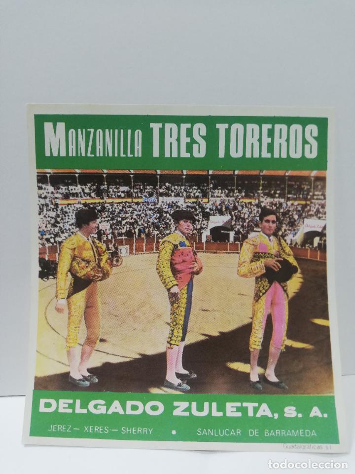 Etiquetas antiguas: ETIQUETA DE VINO. MANZANILLA TRES TOREROS. DELGADO ZULETA, S. A.