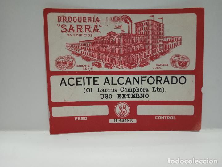 Alte Etiketten: ETIQUETA. DROGUERIA SARRA. ACEITE ALCANFORADO. MEDIDAS : 9 X 7 CM APROX.