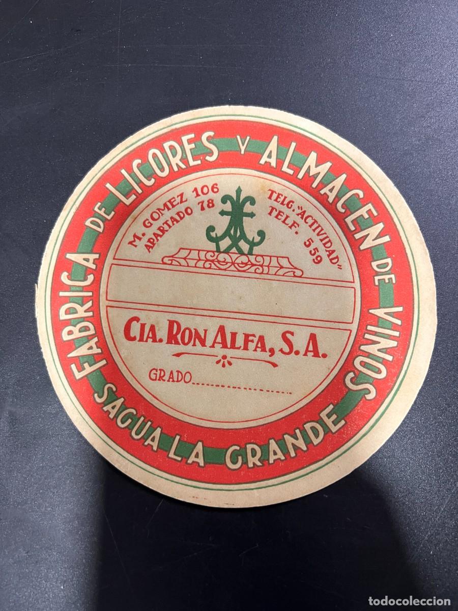 Etichette antiche: ETIQUETA. CUBA. COMPA&Ntilde;&Iacute;A RON ALFA, S.A. F&Aacute;BRICA DE LICORES Y ALMAC&Eacute;N DE VINOS. SAGUA LA GRANDE